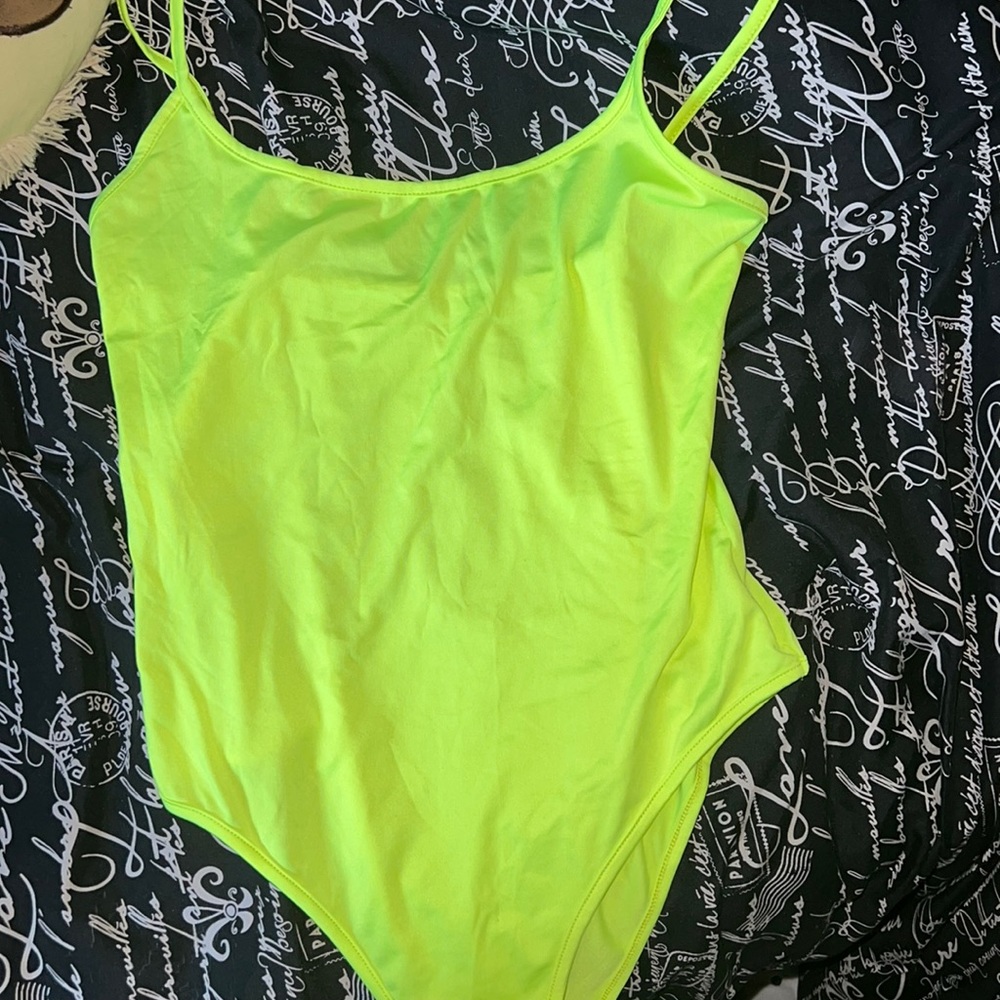 like green bodysuit